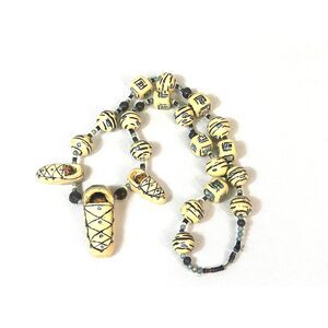 Madi Clark Native American Beaded Clay Necklace Baby Cradleboard